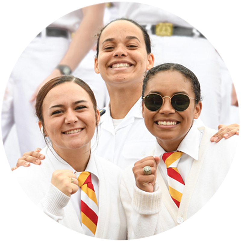 Female cadets showing rings at family weekend sporting event