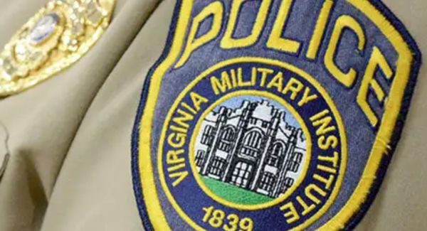 Close-up of VMI Police badge on uniform sleeve.