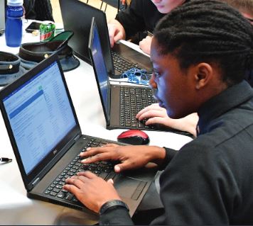 Female cadet at laptop 