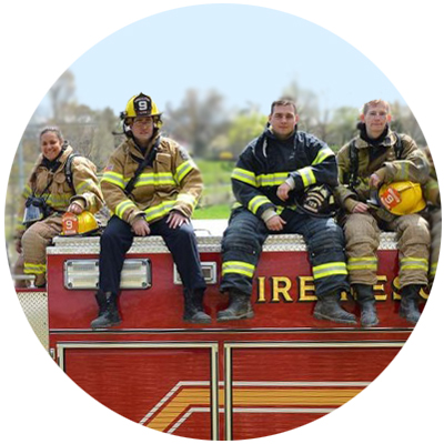 Fire Fighting Lexington club cadet members in uniform sit atop a fire truck photo circle