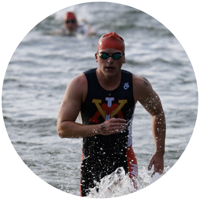Triathlon Club team member splashes out or water from swim photo circle