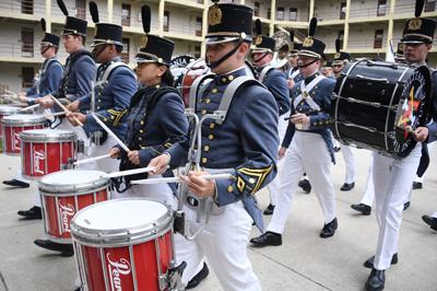 Members of the VMI Drums march and play in barracks April 2022