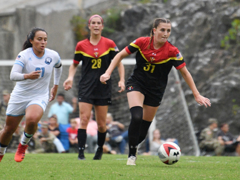 VMI cadets on women's soccer team playing in a match
