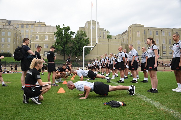 Cadet instructors oversee freshman (rats) during the fitness test.