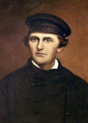 The portrait is of John Thomas Lewis Prestonwas painted by Adele Williams in1907as a young man as he would have looked like in 1855. He is wearing a black button-up coat and an era-appropriate hat.