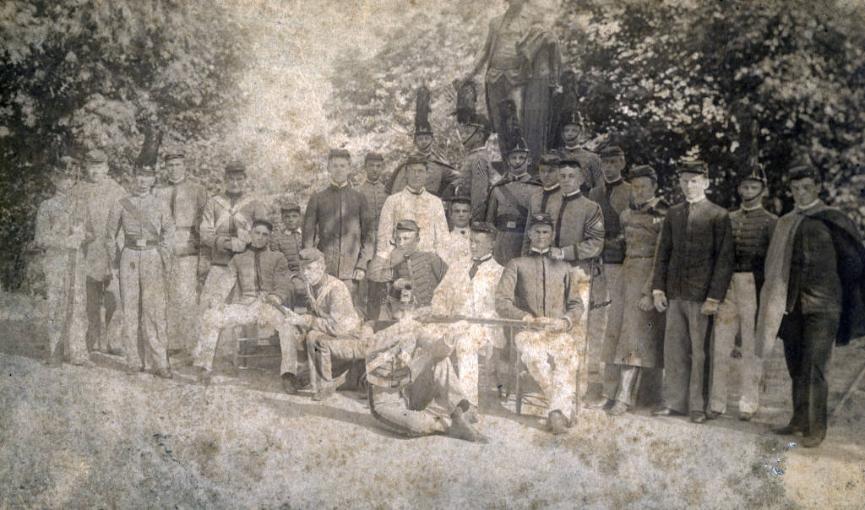 A group of cadets in the various uniforms of the Corps of Cadets