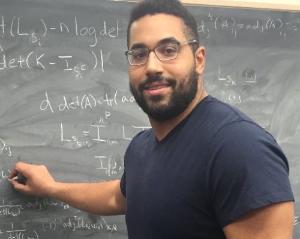 Picture of John Urschel at blackboard