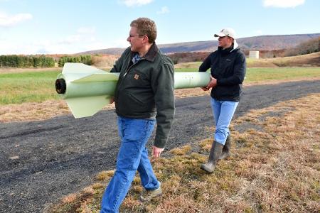 Clay Penney '19 and Col. James Squire travel to Highland County to test their rocket prototype.