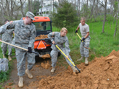 Cadets shoveling dirt