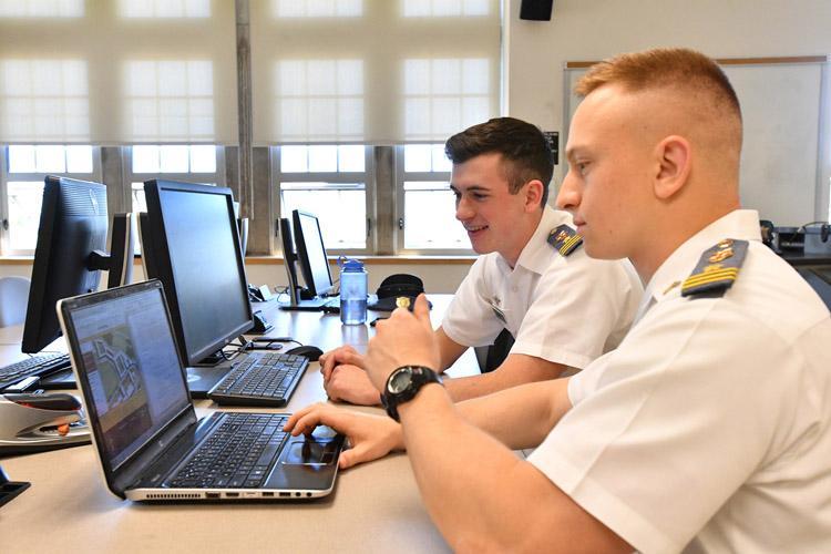 Marc Howe ’17 and Brian Colitti '17 put the final touches on an interactive map of Post that will be used by visitors on VMI’s website. – VMI Photo by Ashlie Walter.