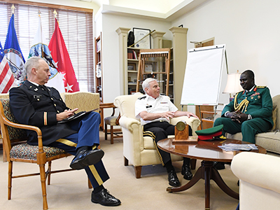 Image of Nigerian army chief of staff talking with Gen. Peay in his office