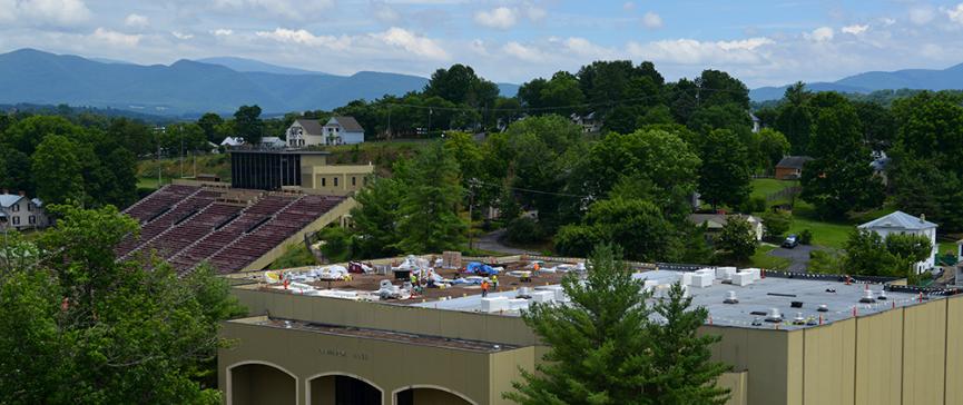 Contractors put new roofing on Cameron Hall.