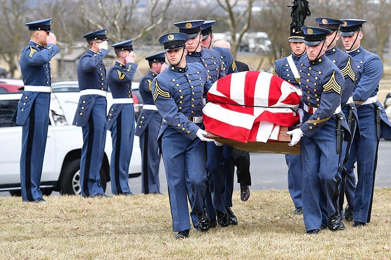 Cadets carry Jack Marsh to his final resting place at New Market battlefield.