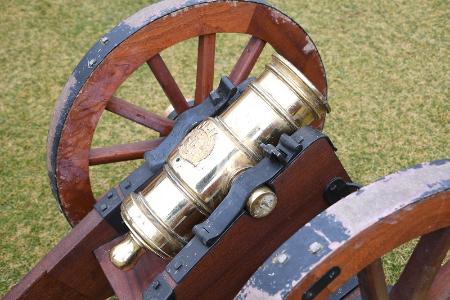 Close-up of restored cannon. Steen Cannons, a Kentucky company that specializes in the restoration of antique artillery, created a new, solid mahogany carriage for the cannon.