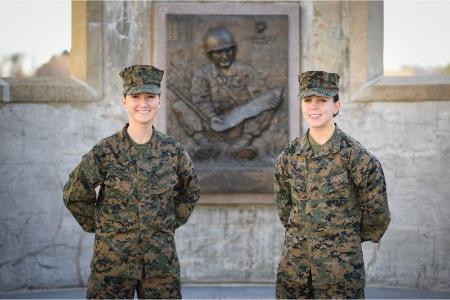 Allie Sassaman '22 and Kasey Meredith, VMI Corps of Cadet's Regimental Commander, pose for photo after being selected for highly competitive Cyberspace Officer Contracts in the U.S. Marine Corps.
