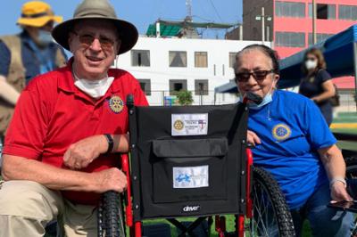 Col. Woodson “Woody” A. Sadler Jr. '66 and wife Lori, during a wheelchair distribution in Ancon, Peru during spring furlough.—Photo by Woody” Sadler