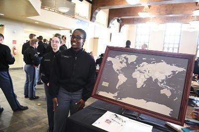VMI cadets stand at heritage map created as part of Language and Cultures Week.